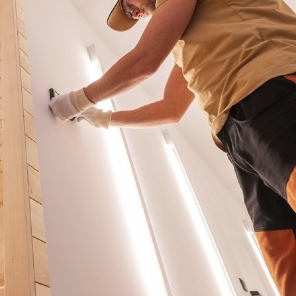 Technical Specialist Installing Thermostat