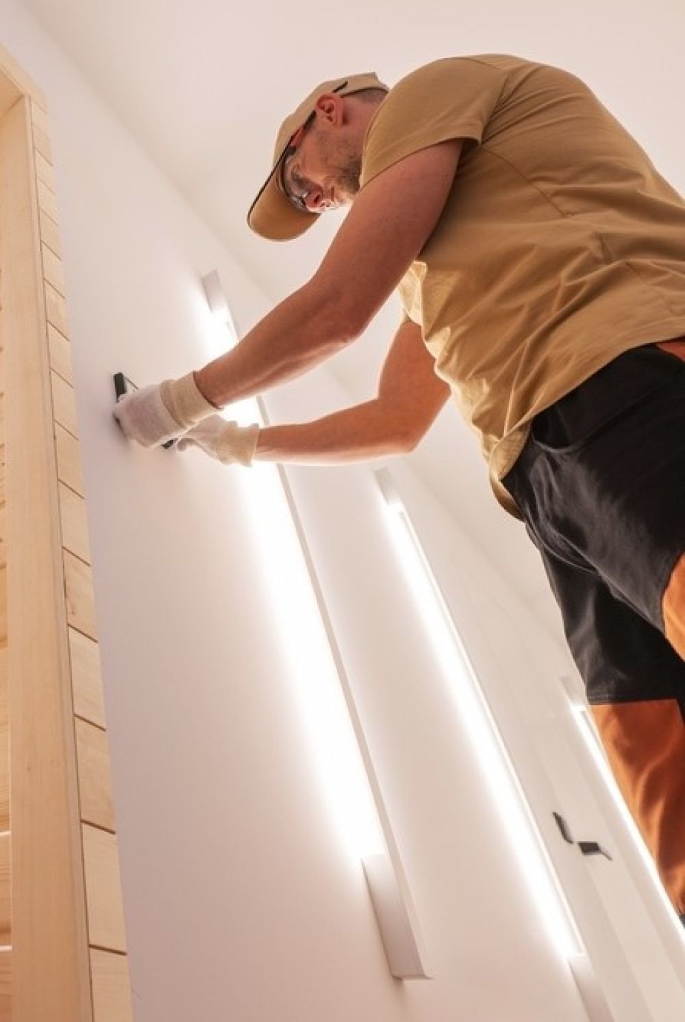 Technical Specialist Installing Thermostat